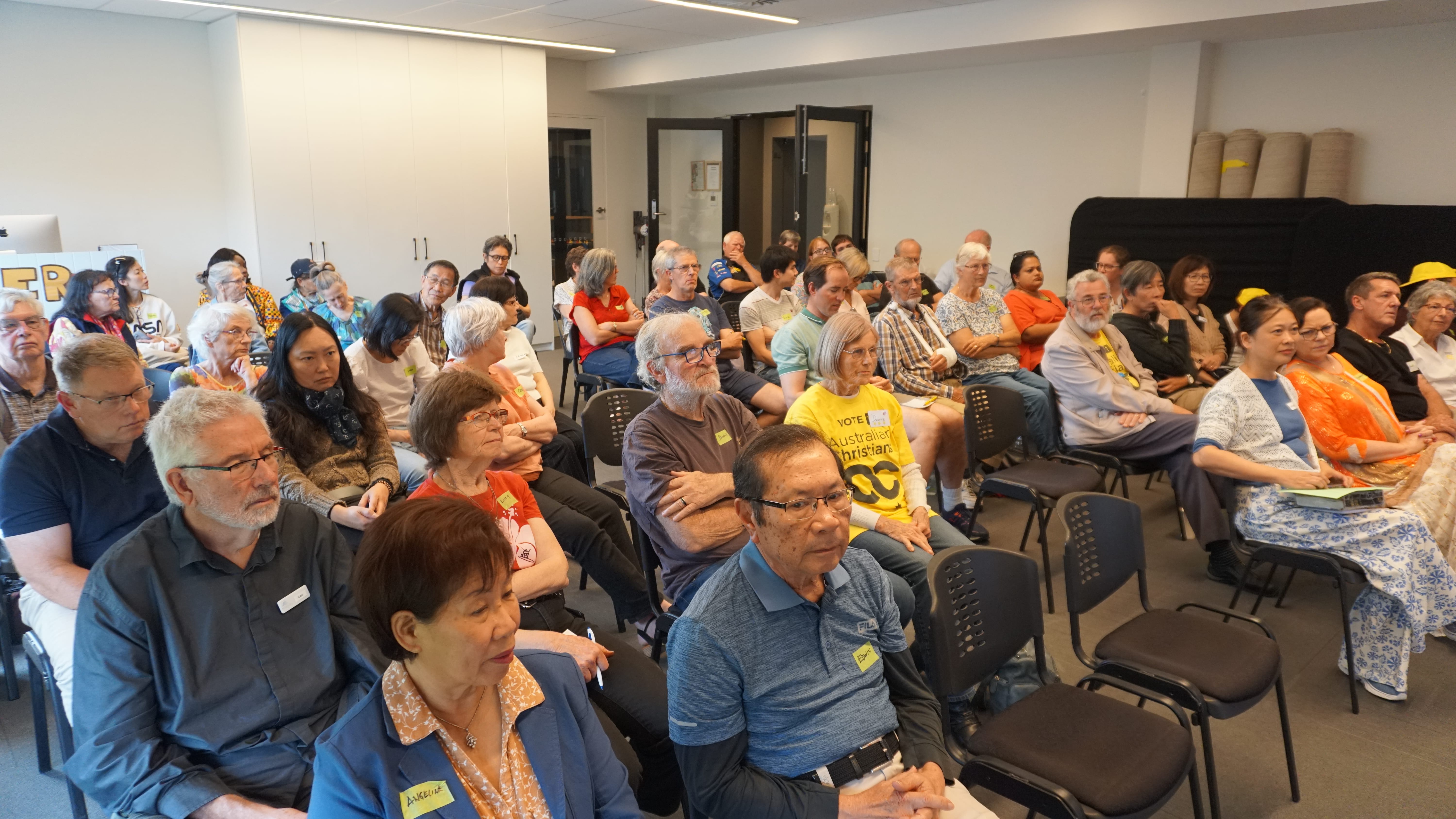 Attendees seated at an Australian Christians community event