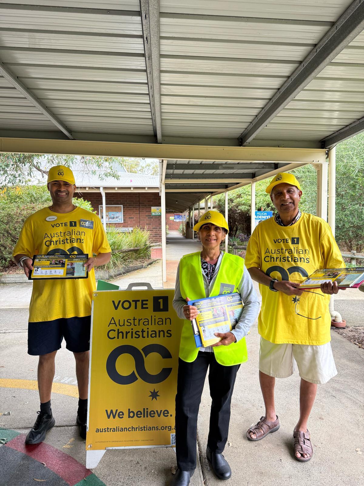 Australian Christians volunteers together with campaign materials